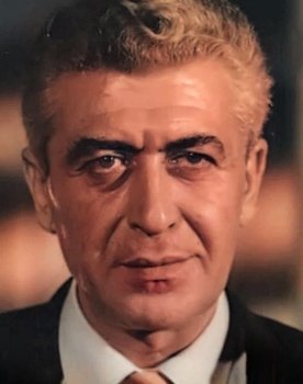 Süha Doğan as 