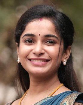 Fouzie Hidhaya as Nithya