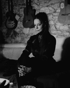 Patrizia Fierimonte as Bukov's Wife