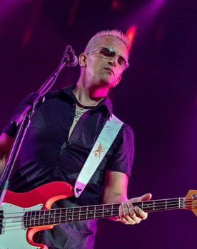 Dejan Ilić as bass guitar