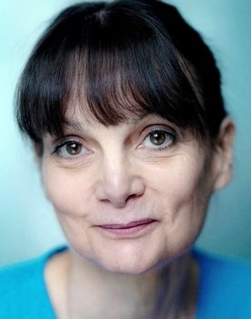 Sophie Froissard as Maria, housekeeper