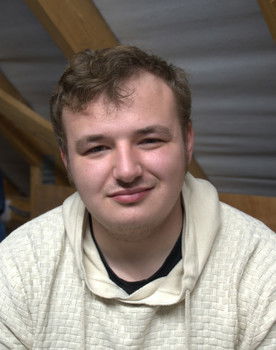 Antony Swan as Reggie Driver