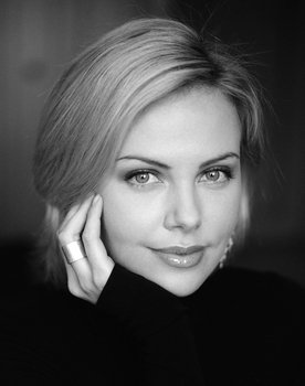 Charlize Theron as Laura Kensington