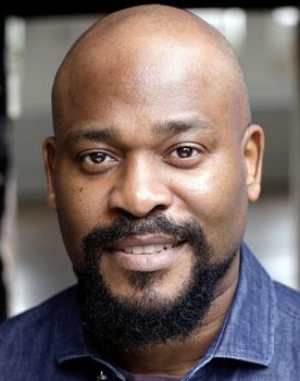 Charles Angiama as Taxi Driver