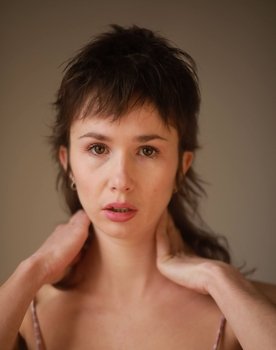 Lola Daniel as The Wife