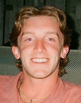 Andrew Marino as Coach Andy