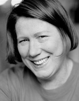 Sylvie Herbert as The Examiner