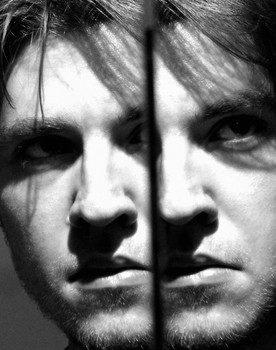 Nikolai Antonov as The Photographer