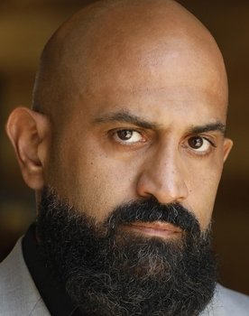 Mike Eshaq as Ahmad the Security Guard