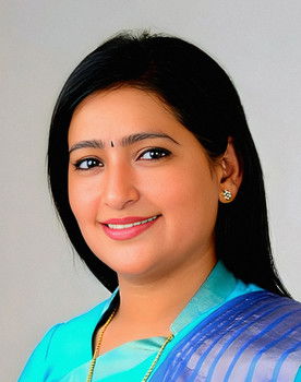 Hetal Parmar as Sarlaben Sanghavi