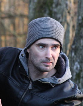 Lukasz Poniatowski as The Man