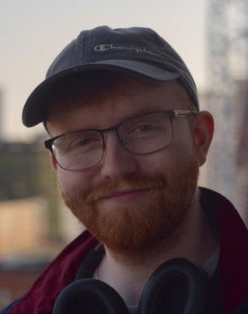 J.J. Vaughan as Kismet commercials voice / Plane passenger