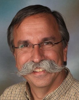 Stéphane Deschênes as Prime Minister Pierre Mustache