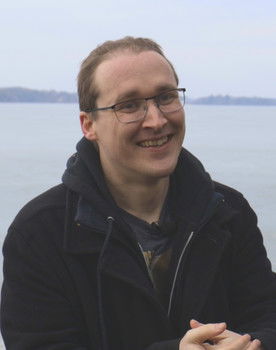 Alex Davidson as Photographotter