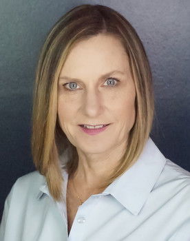 Laura Kehoe as Town Resident