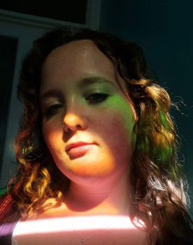 Kerry Behan as News Reporter 1