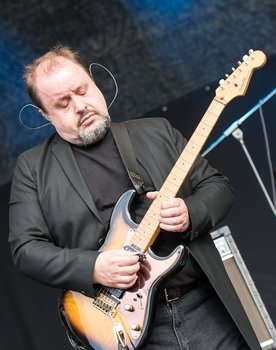 Steve Rothery as 