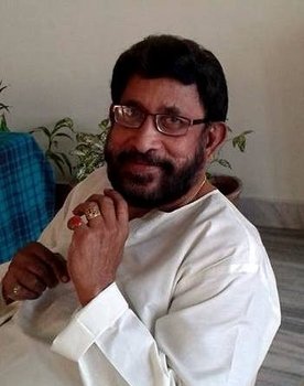 T S Raju