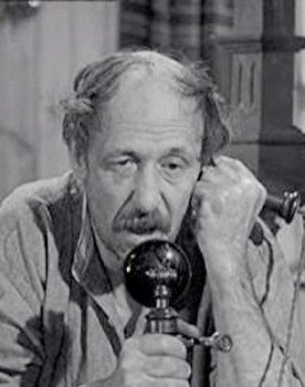Reg Lye as Dairy Farmer