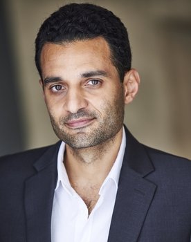 Omar El Gamal as Arabic News Anchor