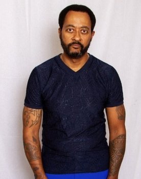 Kerri Perry as Travis