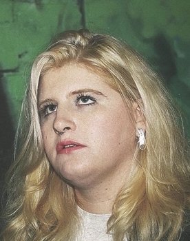 Louise Weard as Michaela 'Traps' Sinclair