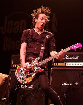 Dougie Needles as Self - Lead Guitar, Backing Vocals