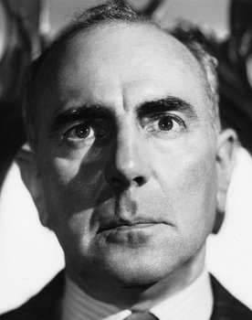 George Zucco as Judge Mackenzie