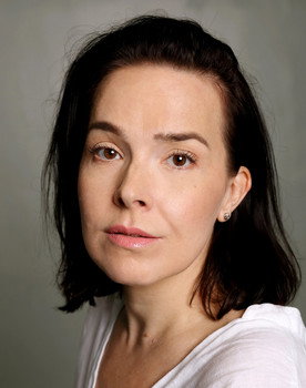 Laura Ala-Ruona as Booth Owner
