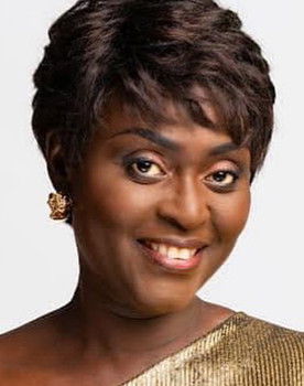 Amélie Mbaye as Mama Janice