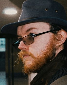 Mikie Holmes as Camera Shop Employee