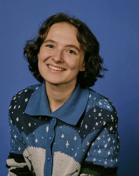 Catie Thorne as Deena