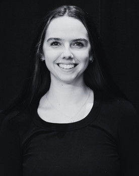 Megan Webb as Cafe Patron