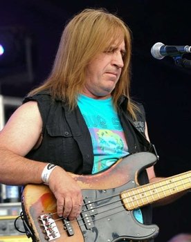 Trevor Bolder as Bass