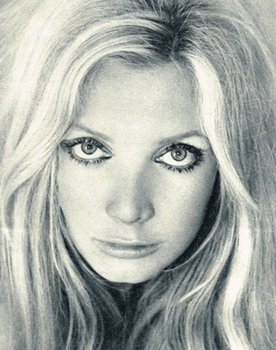 Anna Gaël as Sylviane, la femme de chambre