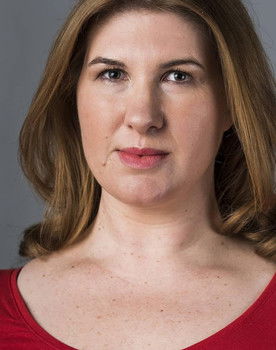 Nicola Clements as The Curator