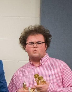 Michael Millican as Priest