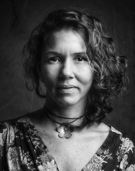 Eliza Capai as Narrator