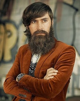 Fábio Allon as Zacarias "Câmera Lenta" Snyder