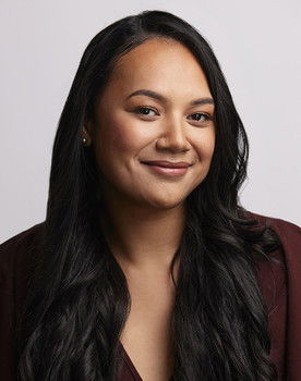 Carrisse Uta’i as Travel Agent