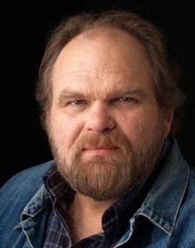 Douglas Roy Dack as Russell