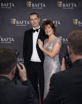 Mark Cornwell as TV News Presenter