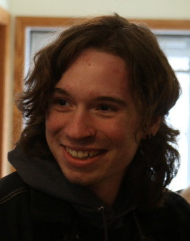 Evan Arraut as Young Woman