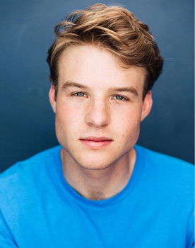 Aidan Micho as Peeta Millark