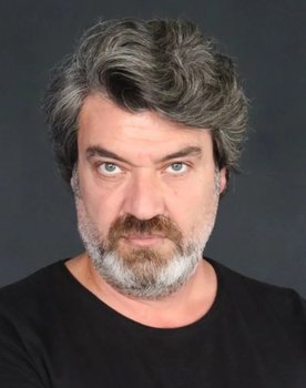 Erol Sertel as 