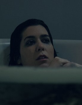 Mishka Balilty as Woman