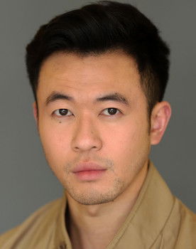 Kevin Leung as Man with Child on TV