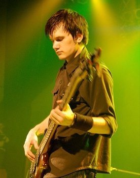 Evgeny Ognev as Бас-гитарист