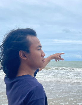 Ruck Thongprapai as Man in a suit