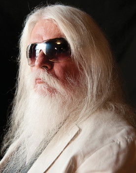 Leon Russell as Radio Preacher